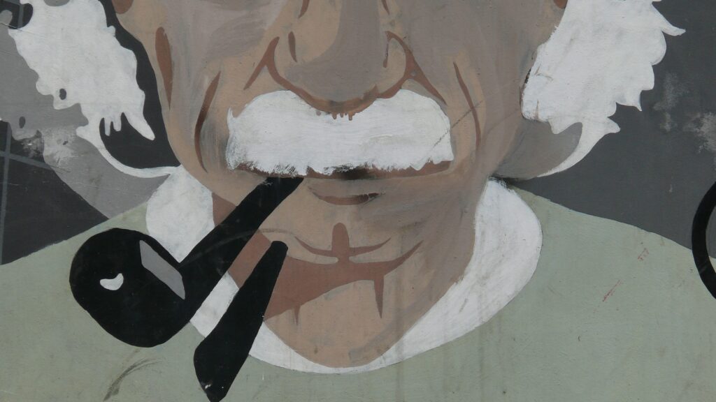 rappresentazione di Einstein con pipa in bocca  stile murales 